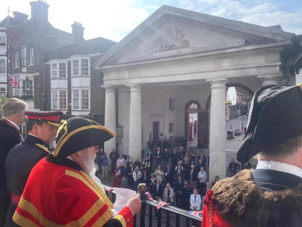 VE Day 80 Crowds watch the flag raising